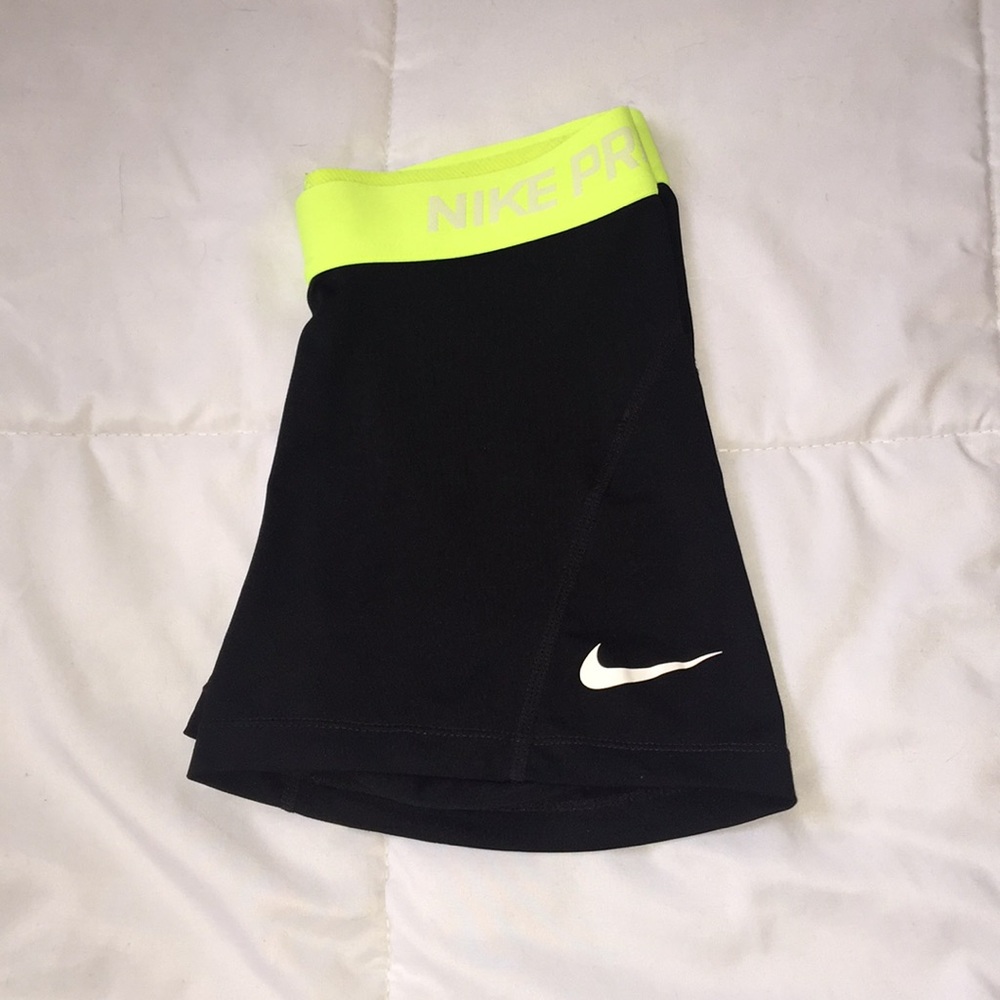 Black and green Nike spandex